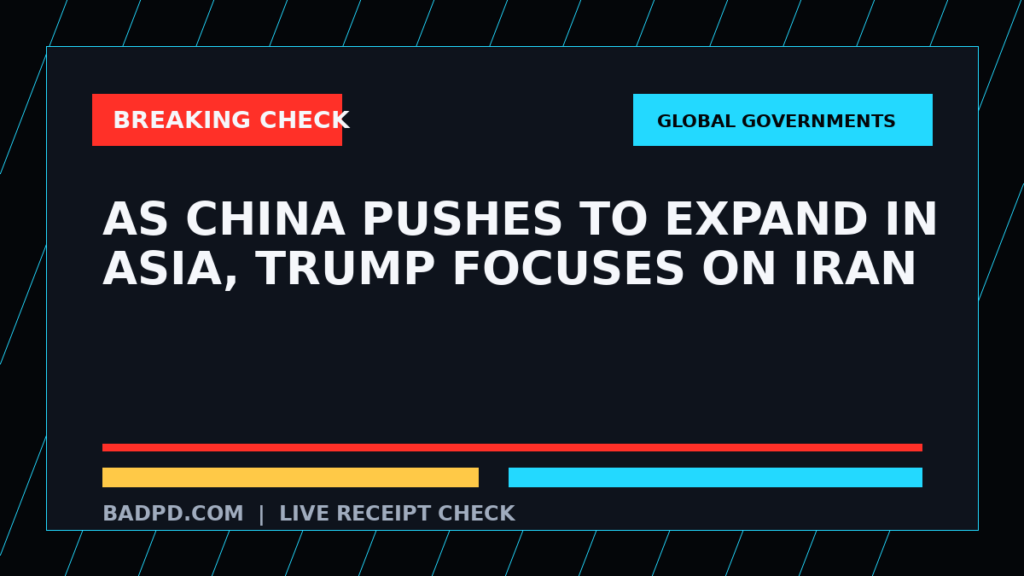 Symbolic editorial breaking-check graphic for As China Pushes to Expand in Asia, Trump Focuses on Iran, not a depiction of the event.