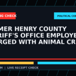 Symbolic editorial breaking-check graphic for Former Henry County Sheriff's Office employee charged with animal cruelty, not a depiction of the event.
