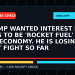 Symbolic editorial breaking-check graphic for Trump wanted interest rate cuts to be 'Rocket Fuel' for the economy. He is losing that fight so far, not a depiction of the event.